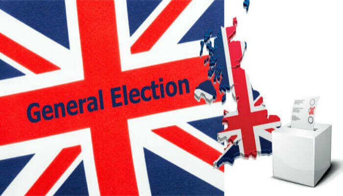 uk general elections sign on a british flag